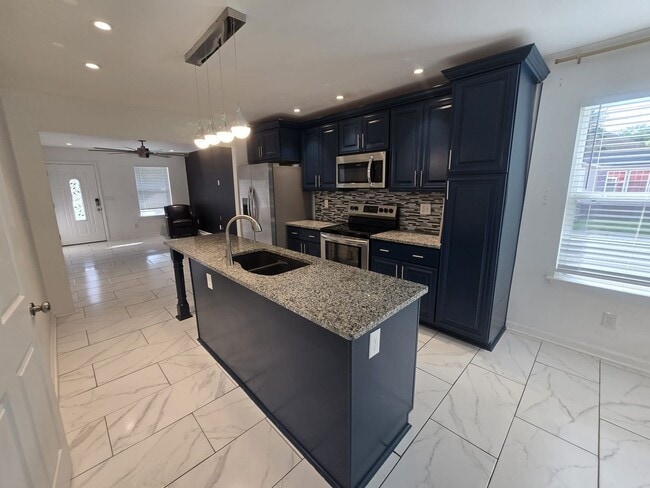 Building Photo - Welcome to The Buchanan Retreat – Modern 4...
