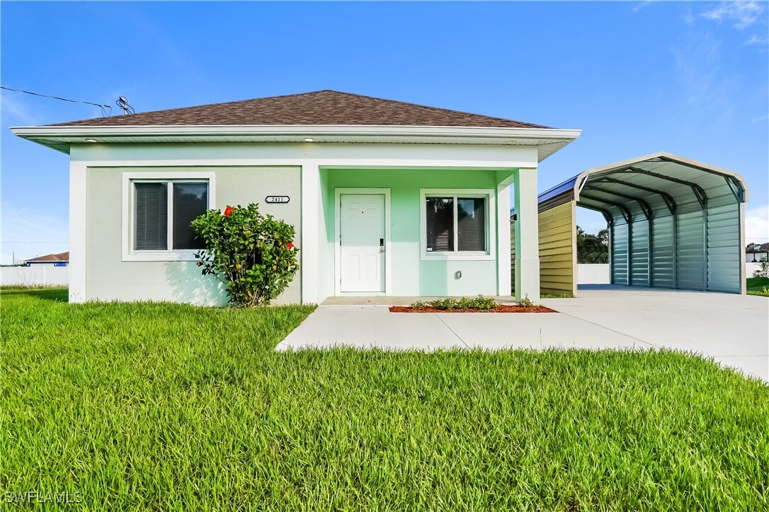 Foto principal - 2411 Claude Ave N