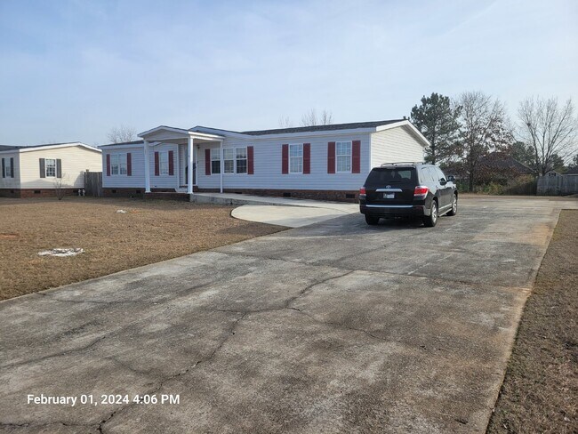 Foto del edificio - Charming 4 Bedroom Manufactured Home in Ka...