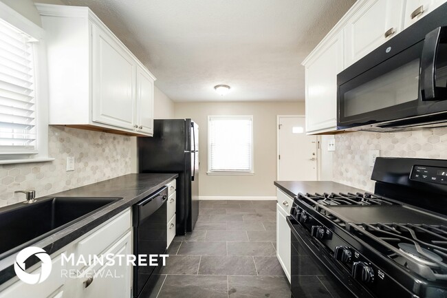 Building Photo - 6667 E 17th St