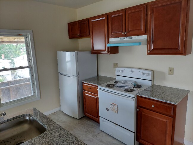 Foto del edificio - 76-76 New Park Ave