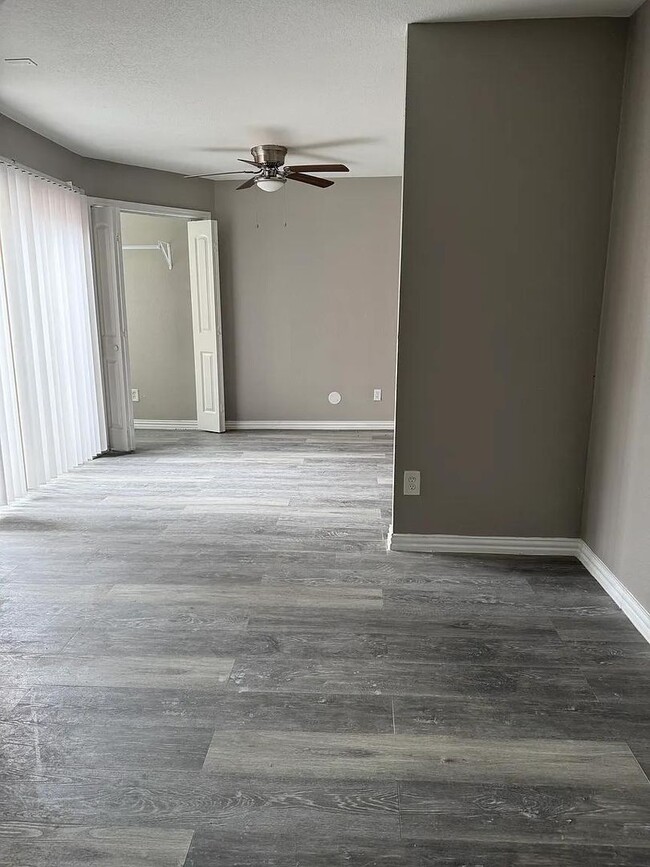 Building Photo - Affordable studio condo with shower-only bath, open layout, and convenient location  perfect for ...