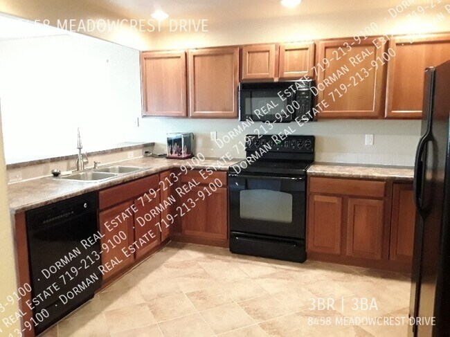 Foto del edificio - 8458 Meadowcrest Dr