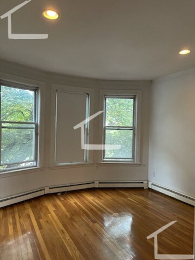Building Photo - Parking Included, In Unit Washer and Dryer...