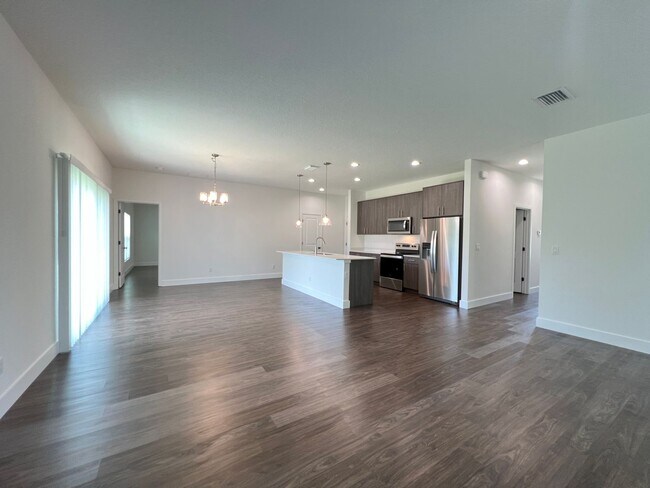 Building Photo - BRAND NEW 4 BD/2BA Home in Beautiful Palm ...