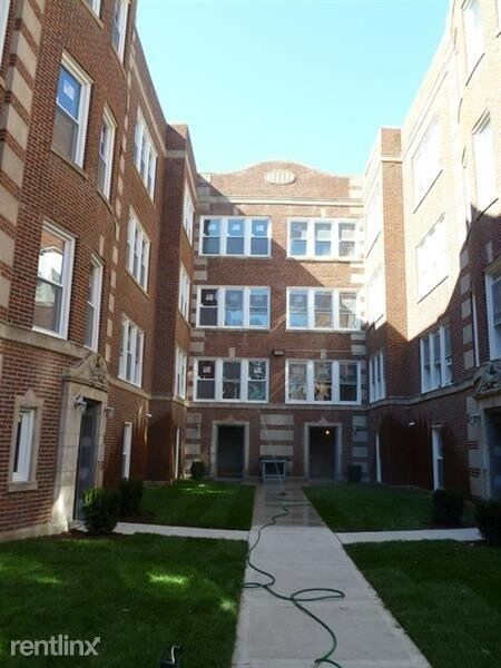 Building Photo - 310 N Menard Ave