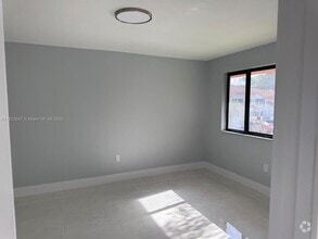 Building Photo - 9700 SW 138th Ave