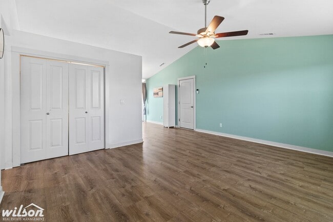 Building Photo - Welcome Home: Big Yard, Garage, and Pets A...