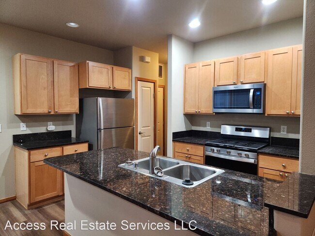 Building Photo - 4 br, 2.5 bath House - 6216 Malloy Ave