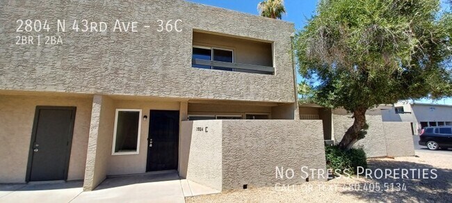 Building Photo - 2 Bedroom Condo at 43rd Ave and Thomas!