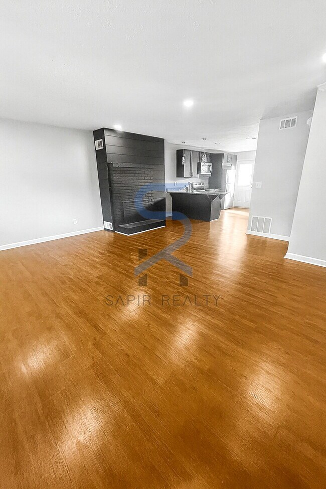 Building Photo - Move in before November 30th and choose your reward: a $250 Amazon Gift Card or a 55" Smart TV!