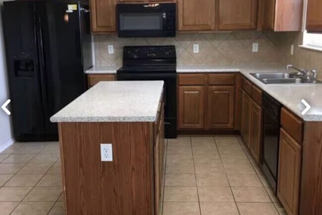 Foto del edificio - 5906 Chuckwagon Cir