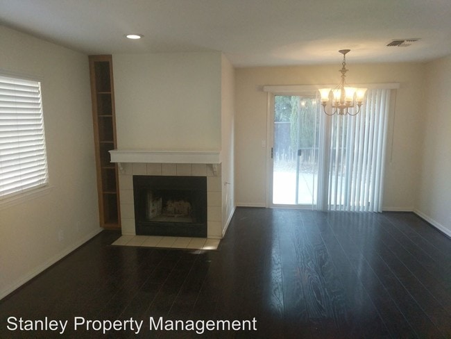 Building Photo - 3 br, 2.5 bath House - 5609 Laguna Park Dr