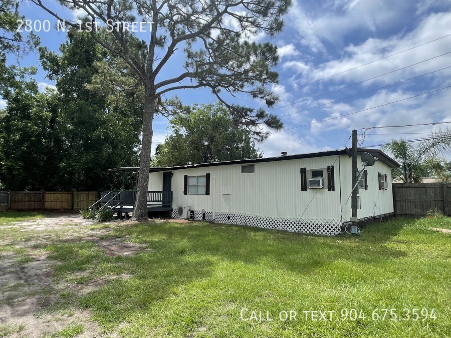 Primary Photo - Manufactured Home on LARGE lot close to Do...