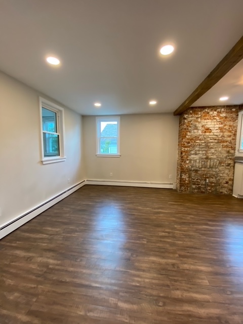 Dining area with exposed brick fireplace - 5101 Kent Way