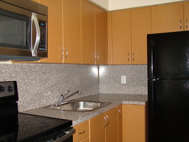 Building Photo - The Perfect Location. The Best Price. 1 Mo...