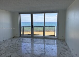 Building Photo - 6039 Collins Ave