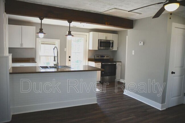 Foto del edificio - 211 W 10th St