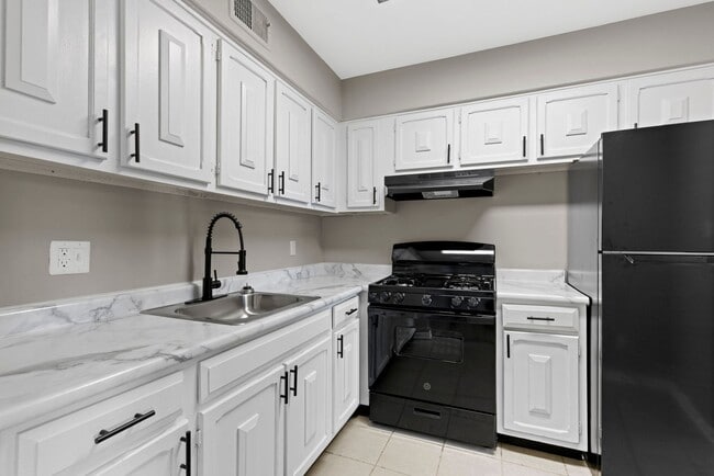 Building Photo - The Cedars Apartment Homes