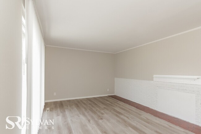 Building Photo - You will love this charming brick home