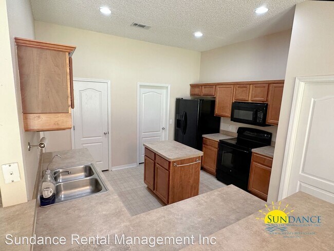 Foto del edificio - 4 br, 2 bath House - 5991 Ashton Woods Circle