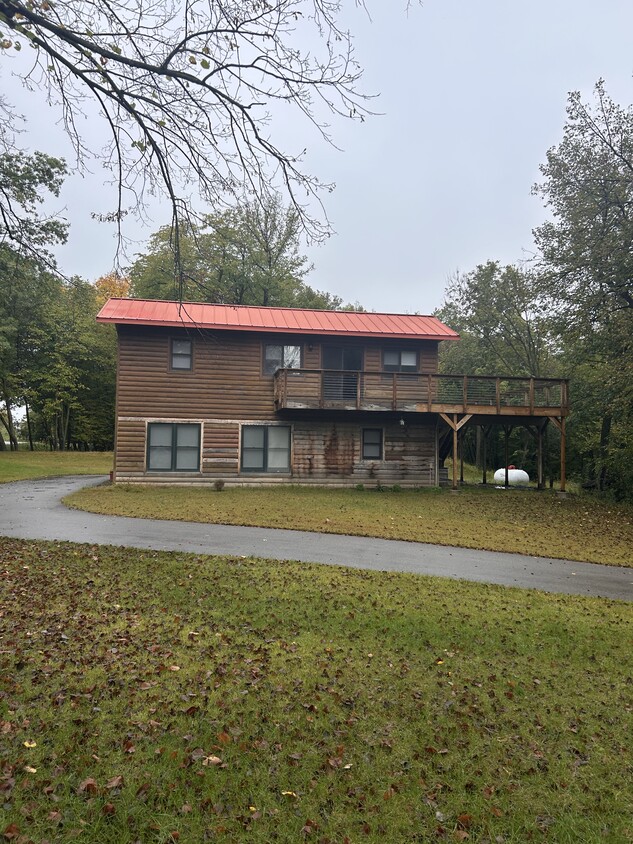 2 story with walk out deck and patio. - 12275 62nd St NE