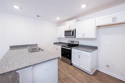 Building Photo - Townhome located in Oakmont Valley - 4 bedrooms, 2.5 bathrooms