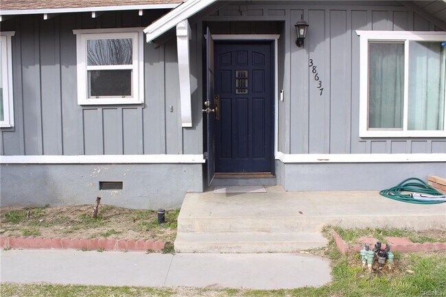 Building Photo - 38637 Yucca Tree St