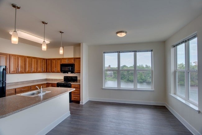 Water Views in Select Apts - Rivers Edge Apartments and Studio for the Arts