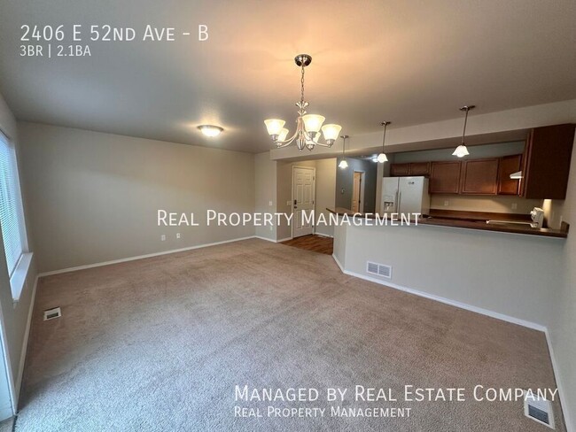 Building Photo - 2406 E 52nd Ave