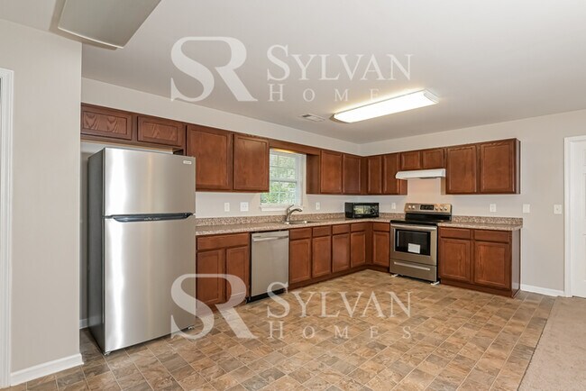 Building Photo - Fall in love with this spacious 3BR 2BA home