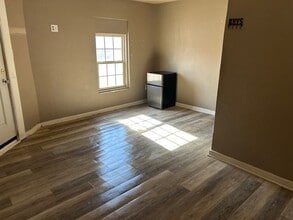 Building Photo - 2070 N Us Highway 69 Unit 2