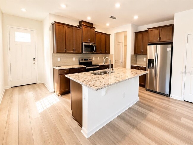 Building Photo - 3309 Canna Lily Pl