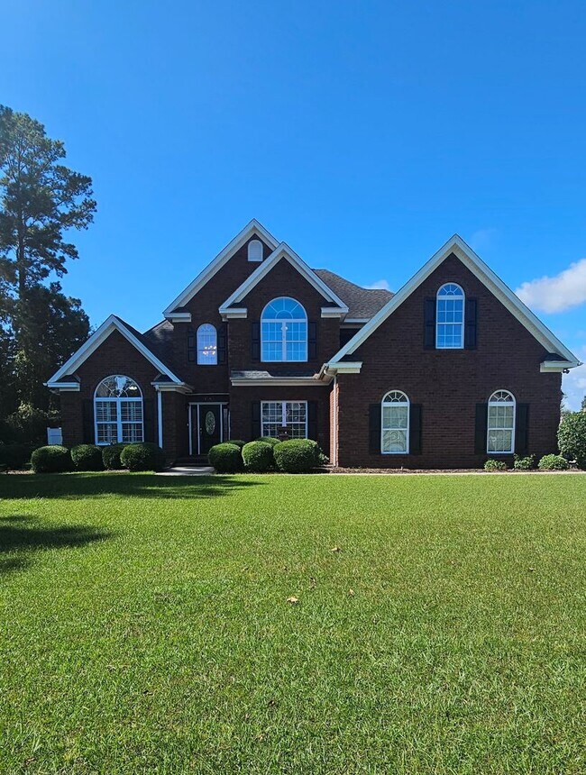 Building Photo - “Elegant 5-Bed Executive Home with Pool – ...