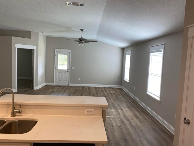 Building Photo - 9238 E River Dr