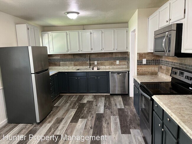 Foto del edificio - 4 br, 2 bath House - 2400 S Nettleton Ave
