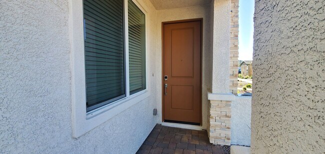 Building Photo - Contemporary townhome with modern exterior and attached garage.