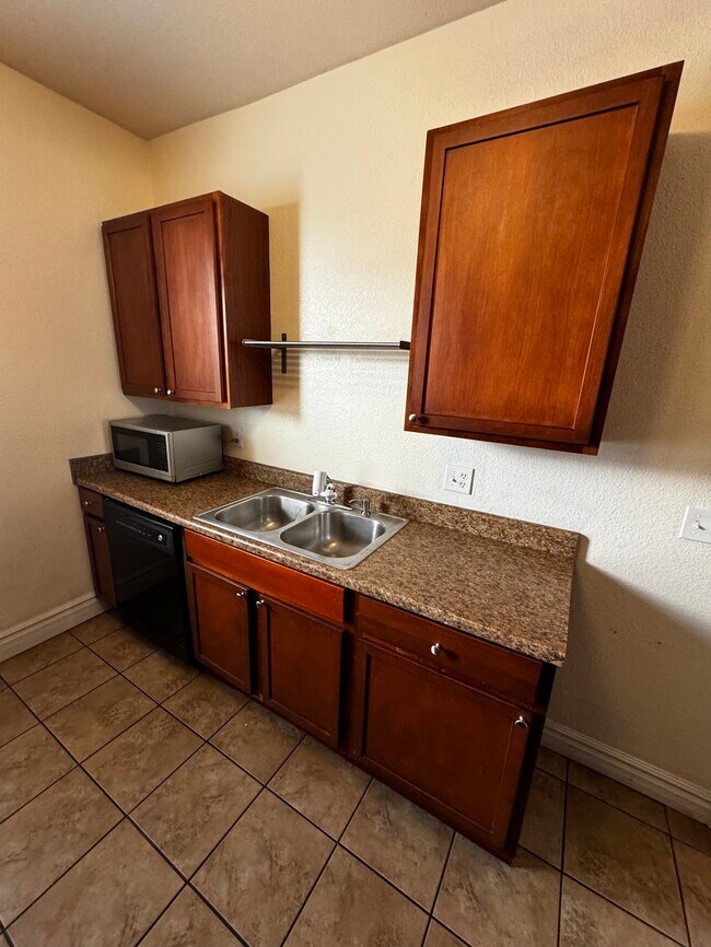Kitchen p2. Large sink with garbage disposal. - 1456 Pennsylvania St