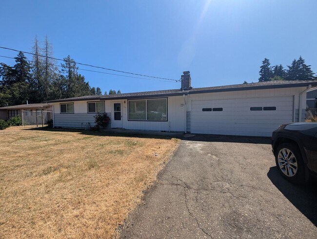 Building Photo - Rambler with large yard and storage shed...