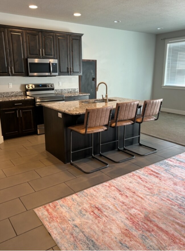 Foto del edificio - Stylish 3-Bedroom Townhome in Traverse Mou...