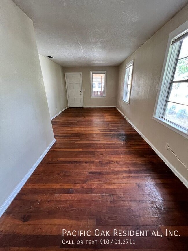 BELOW MARKET RENT! photo'