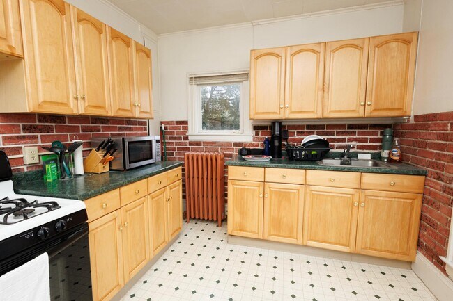 Kitchen wit gas stove and plenty of cabinets, Big enough to eat in. - 39 Homer Ave