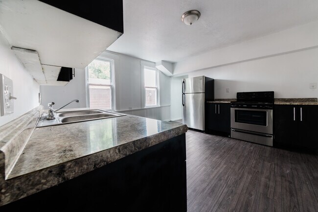 Building Photo - AVAILABLE AUGUST - Spacious 4 Bedroom Home...