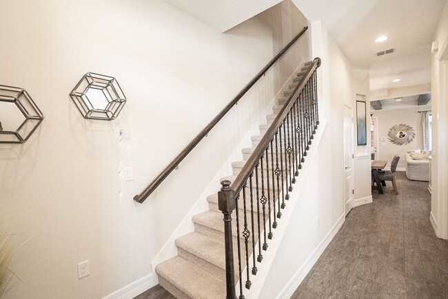 Photo - 3/2.5 Beautiful Model Townhome with Screened Courtyard & 2 Car Garage