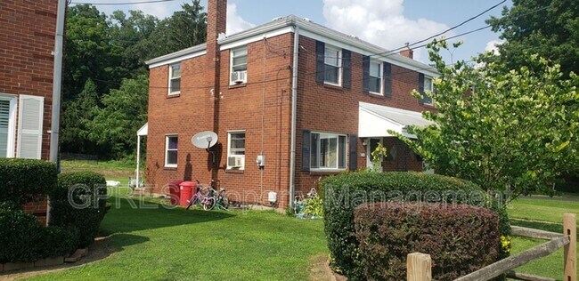 Building Photo - 1403-1405 Spruce St.
