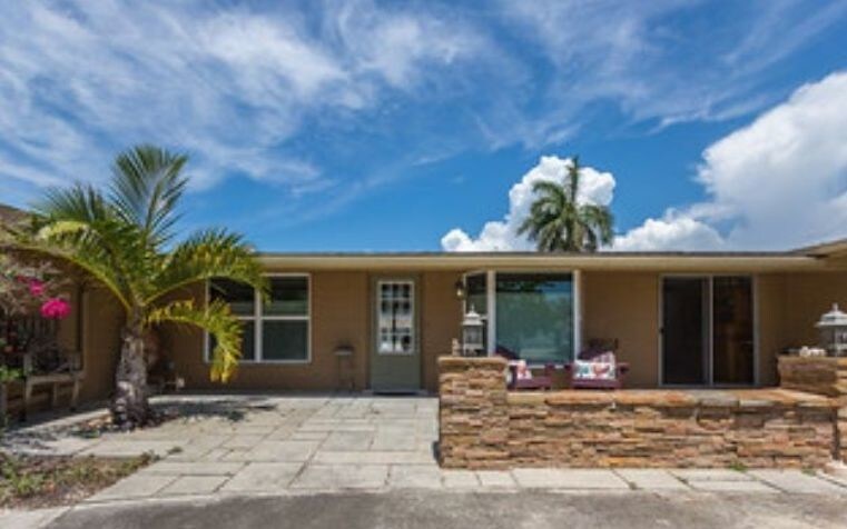 Primary Photo - Amazing 3 Bedroom 2 Bath Waterfront Pool Home