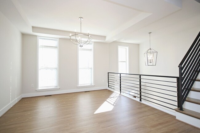 Building Photo - Spacious Avinity Townhome