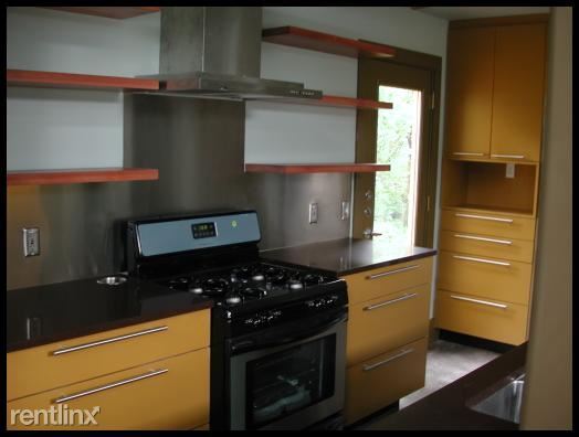 Building Photo - 3 br, 2 bath House - 1124 Chicon A Unit A