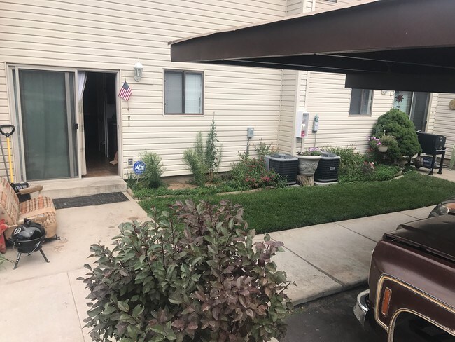 Back Door with covered parking - 7486 S 1000 E