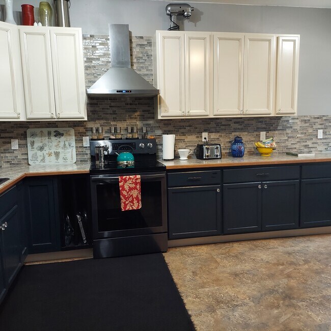 Abundant cabinets and counter top - 33 S Main St